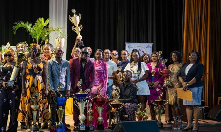 GYSBI/Muneshwers receives trophies for Mashramani Band